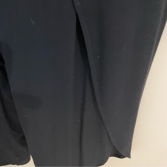 Melissa Nepton black off shoulder jumpsuit with flutter sleeves and tulip legs. - Picture 9 of 9